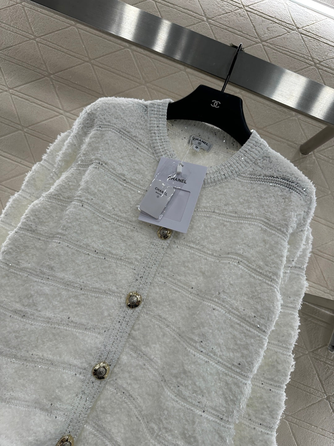C 25 Crew-neck sequined knitted wool cardigan