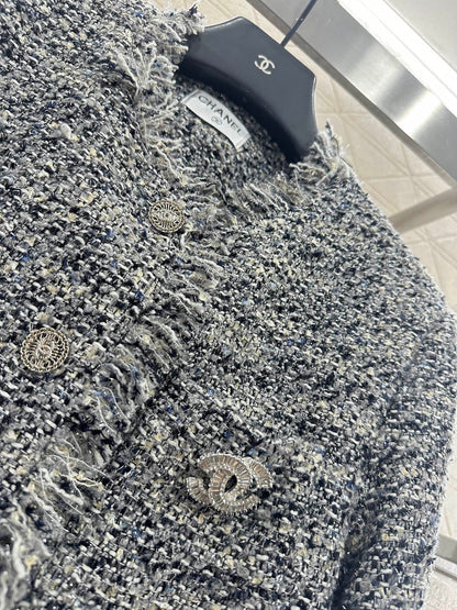 C 25 Fringed quilted wool coat