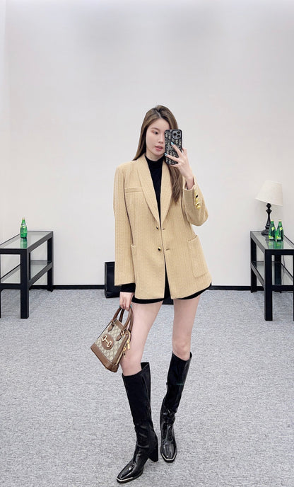 sc 25 Knitted cable-knit wool blazer