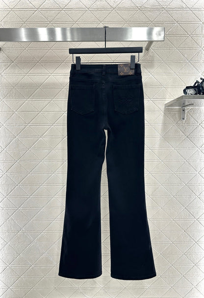 L 25 Leather label denim trousers