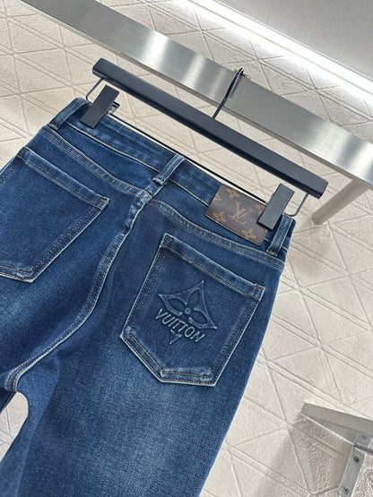 L 25 Leather label denim trousers